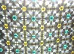 Square pattern with yellow and light green flower design