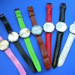 wholesale ladies watches. Fun theme clock face design on ladies watch, with colored imitation leather band.