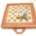 wooden chess set. Handcarved wooden chess sets in square shape, detailed carvings on sides and top.