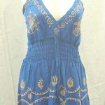 wholesale summer dresses usa. Deep V rayon sundress with embroidery. Adjustable shoulder stripes. Elasticised smocked waist.