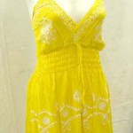 Wholesale summer dresses. Deep V rayon sundress with embroidery. Adjustable shoulder stripes. Elasticised smocked waist.