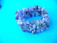 Multi gem stone chip bracelet in light colors with wide band
